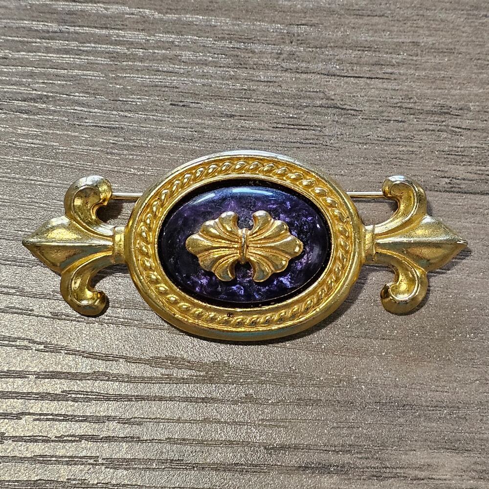 Vintage Ben Amun Gold Fleur De Lis Oval Brooch with Purple Center